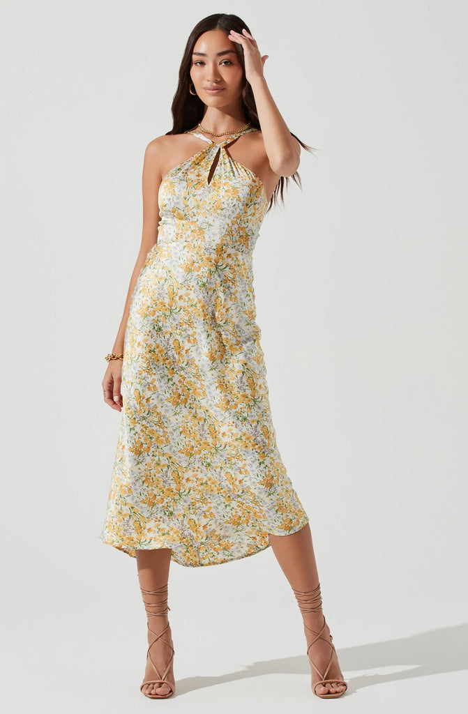 Model wearing Sandrine Floral Halter Midi Dress Cream Yellow